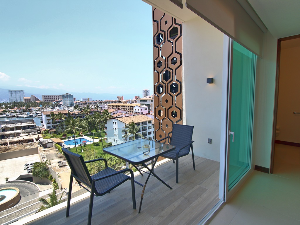 View of Marina Vallarta from balcony. Outdoor table and chairs on balcony