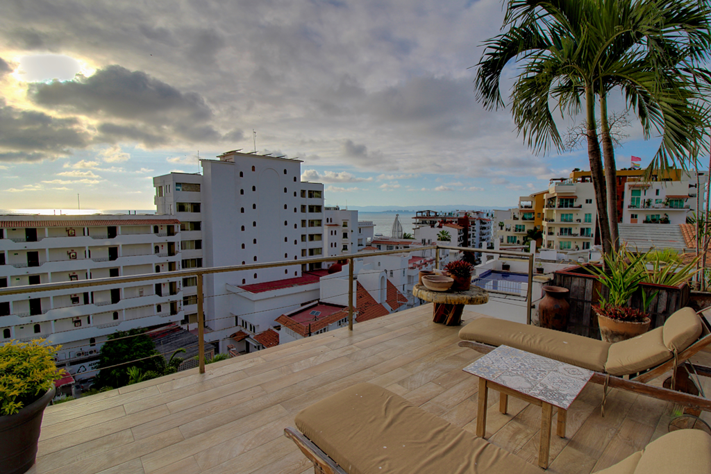 View to Los Muertos Pier from the private terrace Sunsets Above Zona Romántica